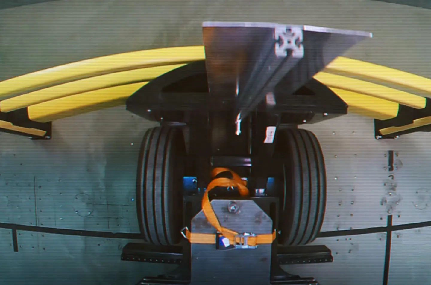 Impact test shown with a rolling weighted vehicle impacting Axelent polymer barrier rails to show the deflection and absorption of the force