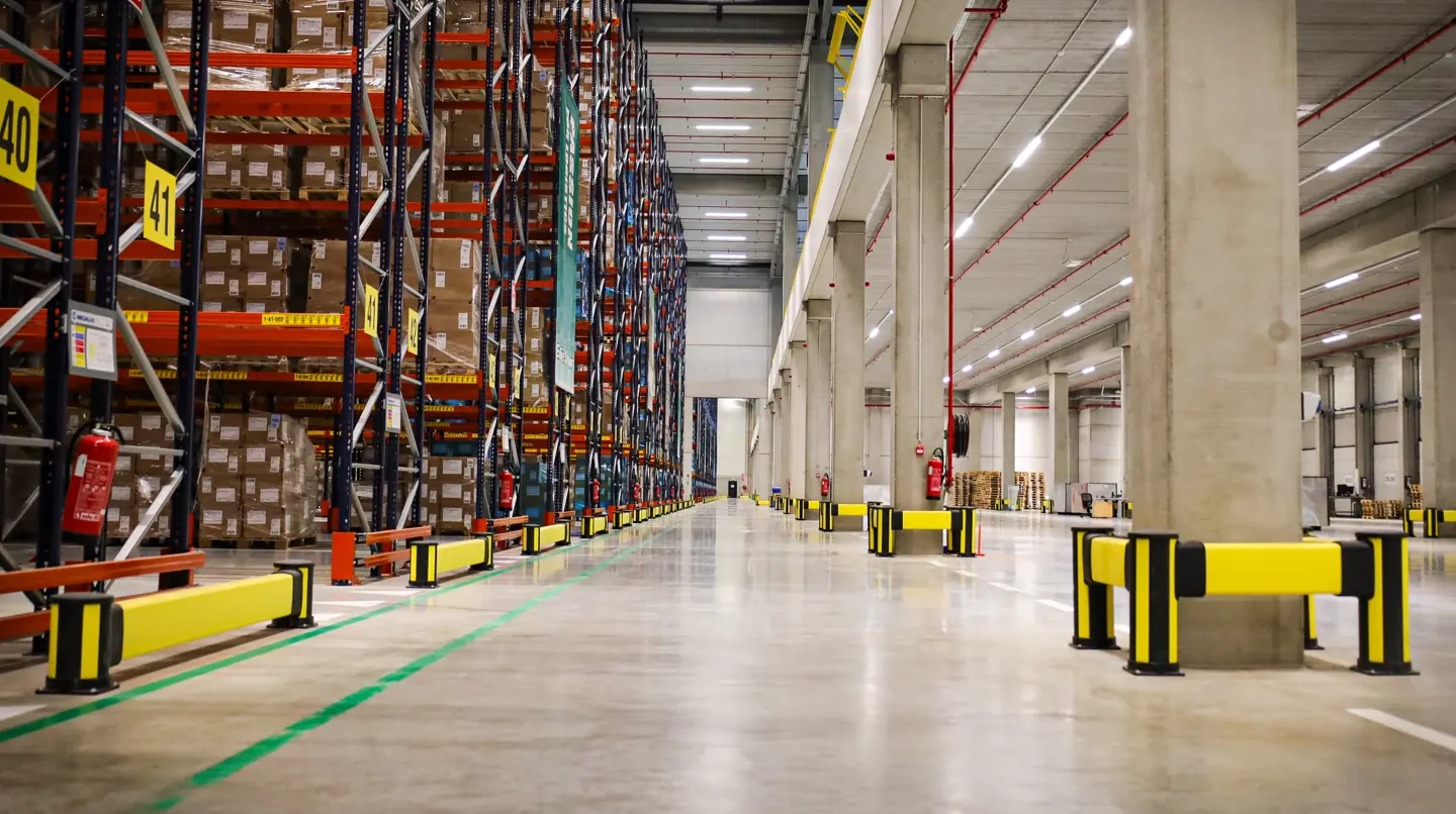 Axelent rack end impact protection and column guarding shown in a warehouse