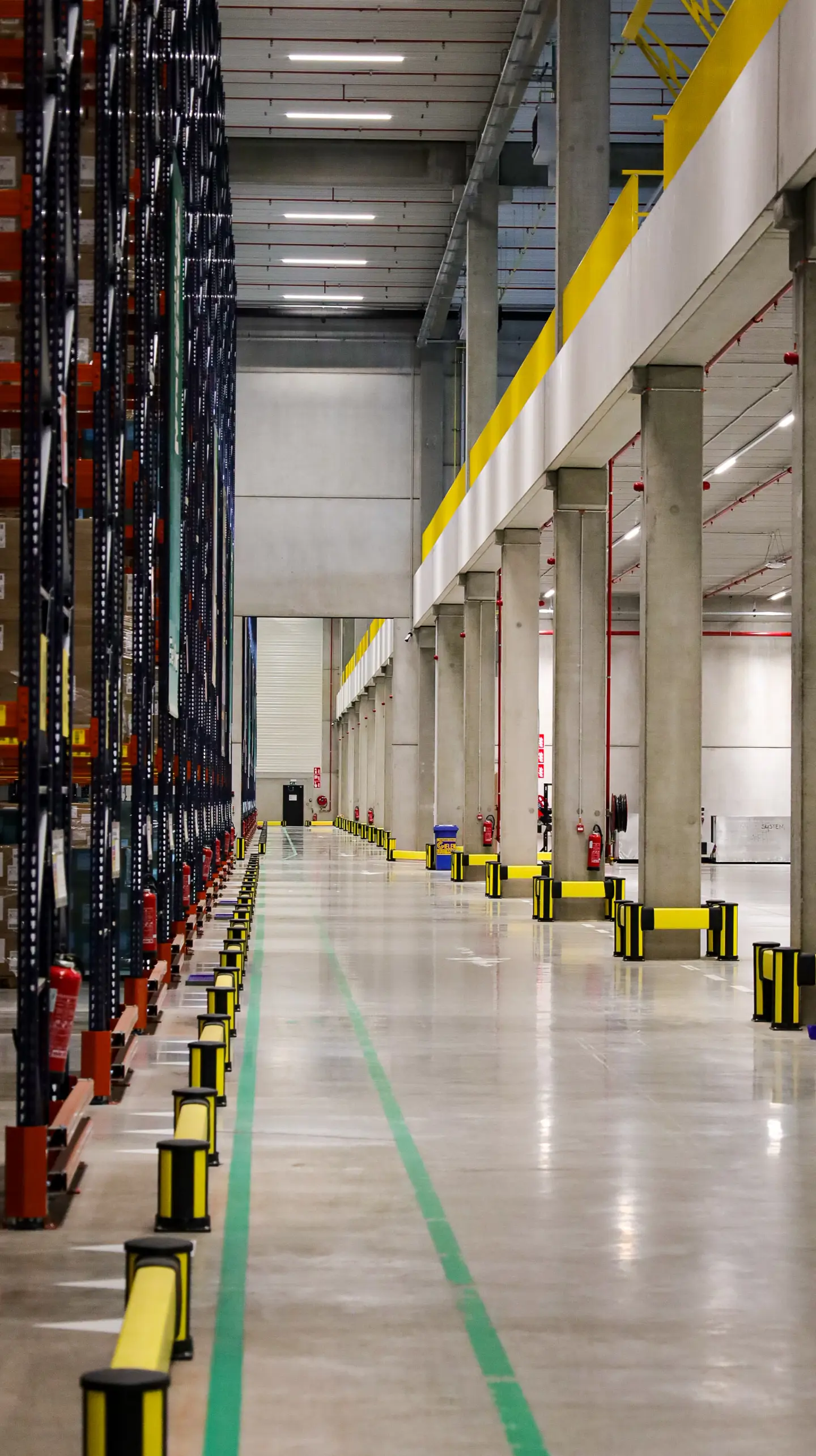 Axelent rack end protection and column guards shown in warehouse