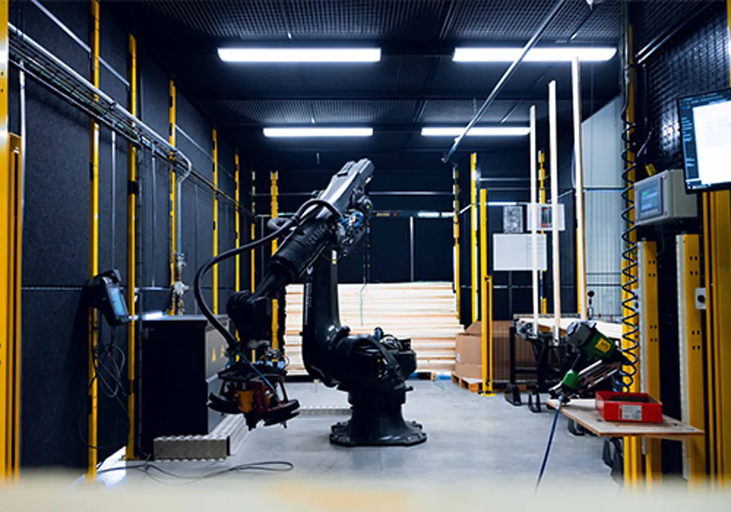Robotic arm shown protected by guarding
