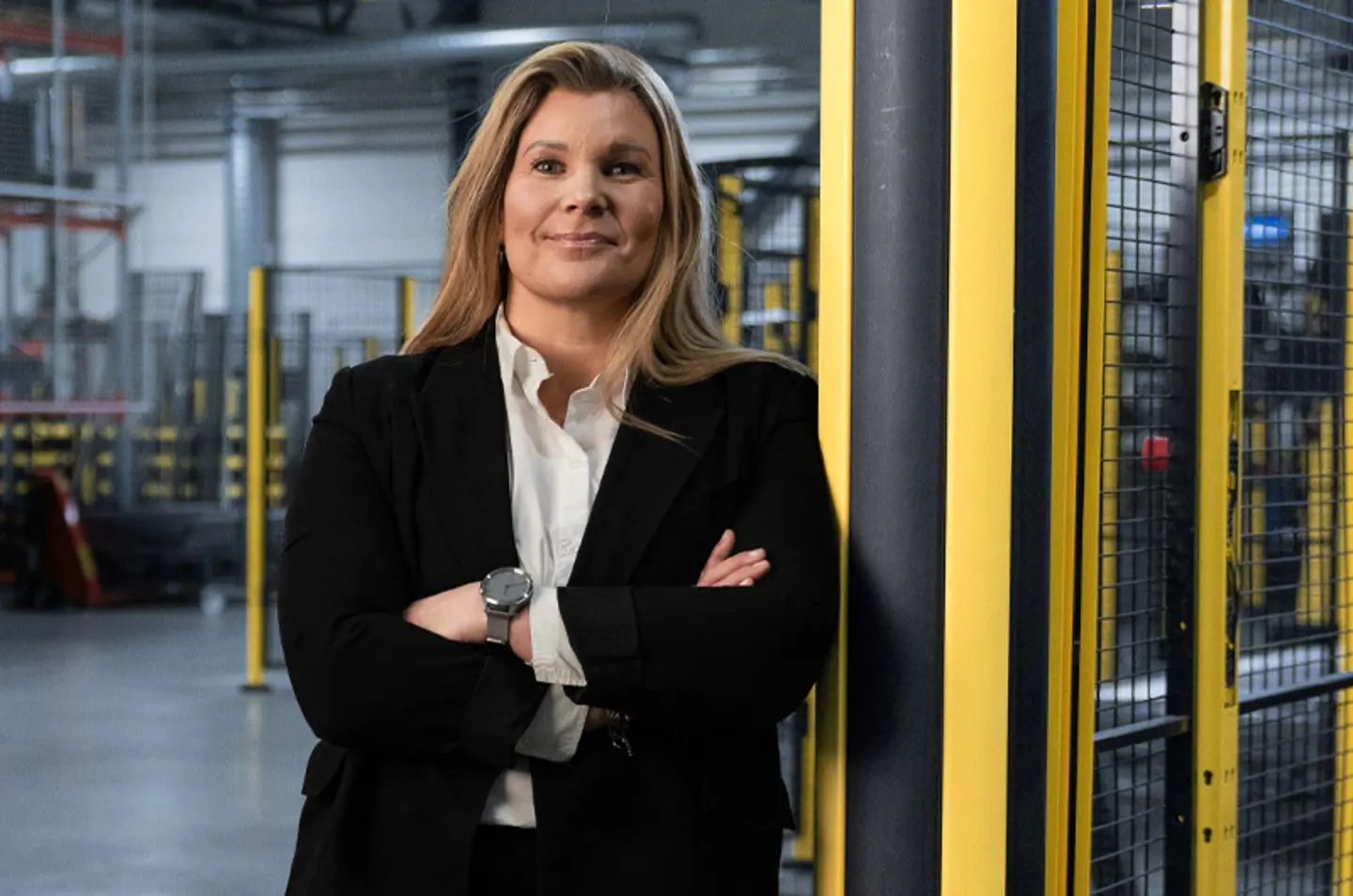 An image of Karin Sanden Ahlqvist the Axelent CEO in a factory setting