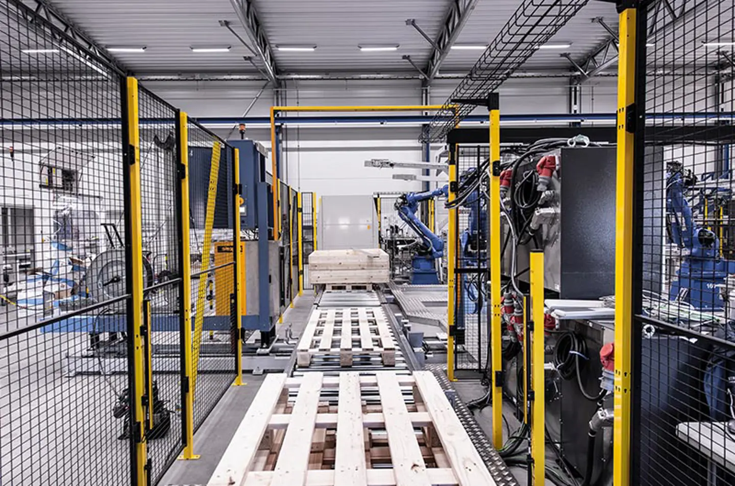 Conveyor belt system inside a business carrying pallets